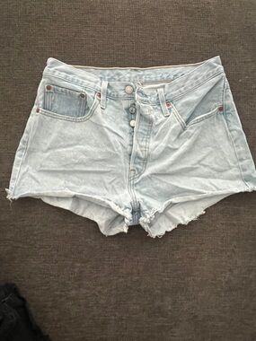 Levi’s Light Wash Distressed Denim Shorts